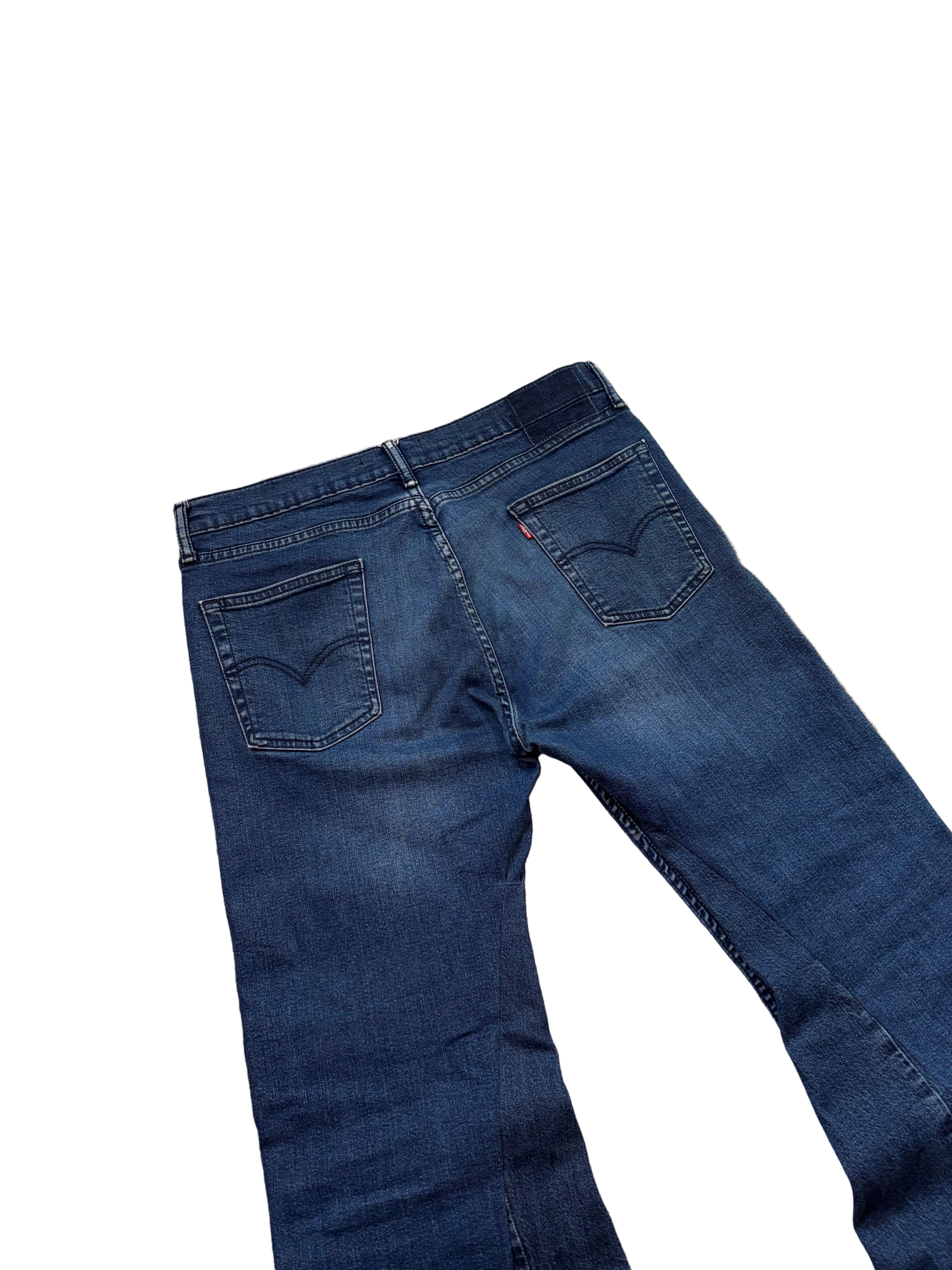 1of1 Vintage dark blue flared jeans. Size: 34x34