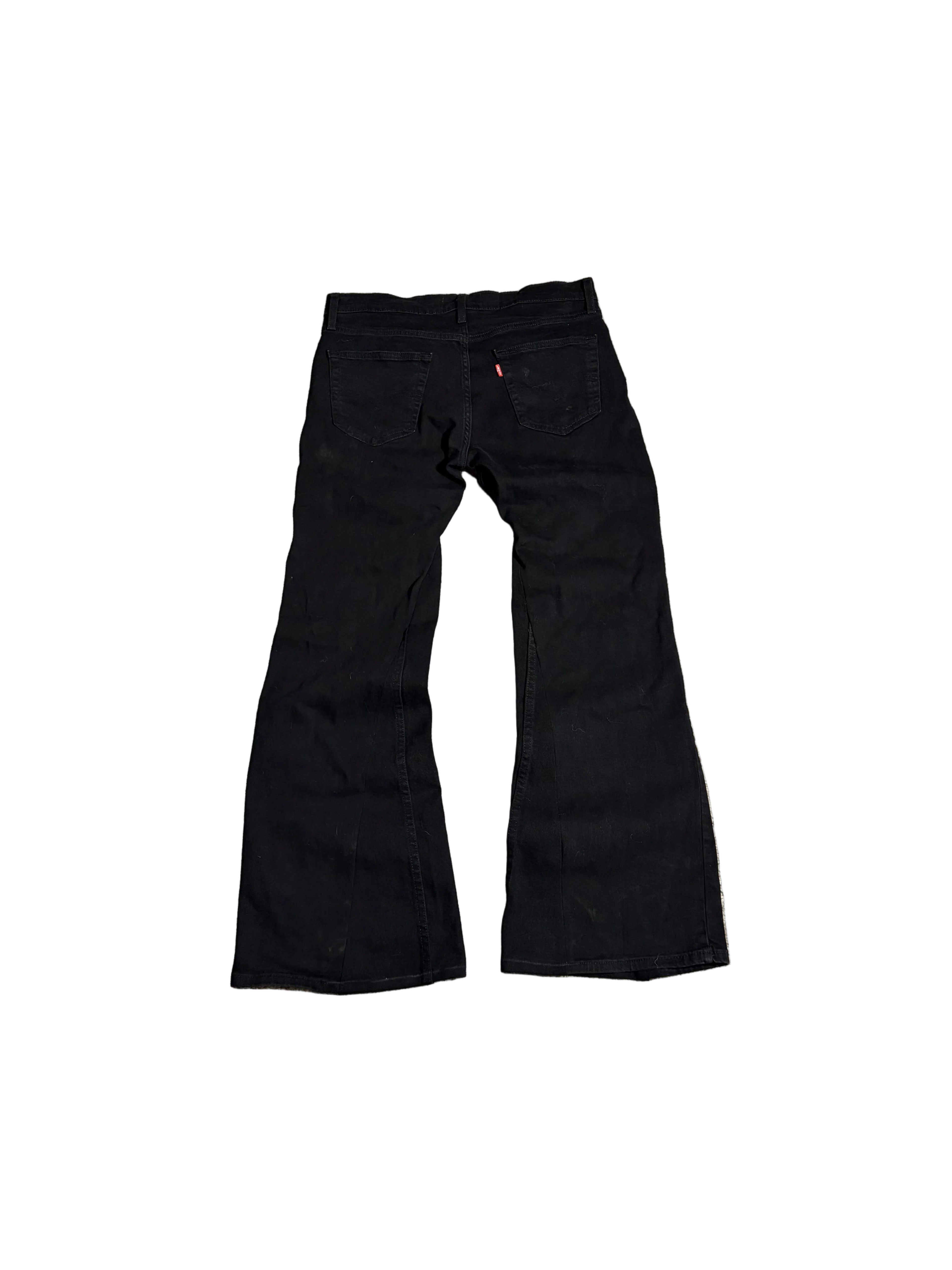 Black flared jeans. Size: 34x34