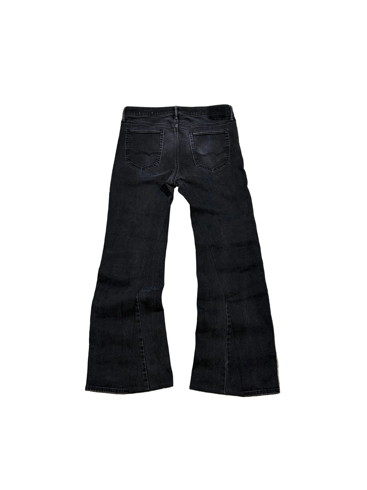 1of1 black stacked flared jeans. Size: 34x34