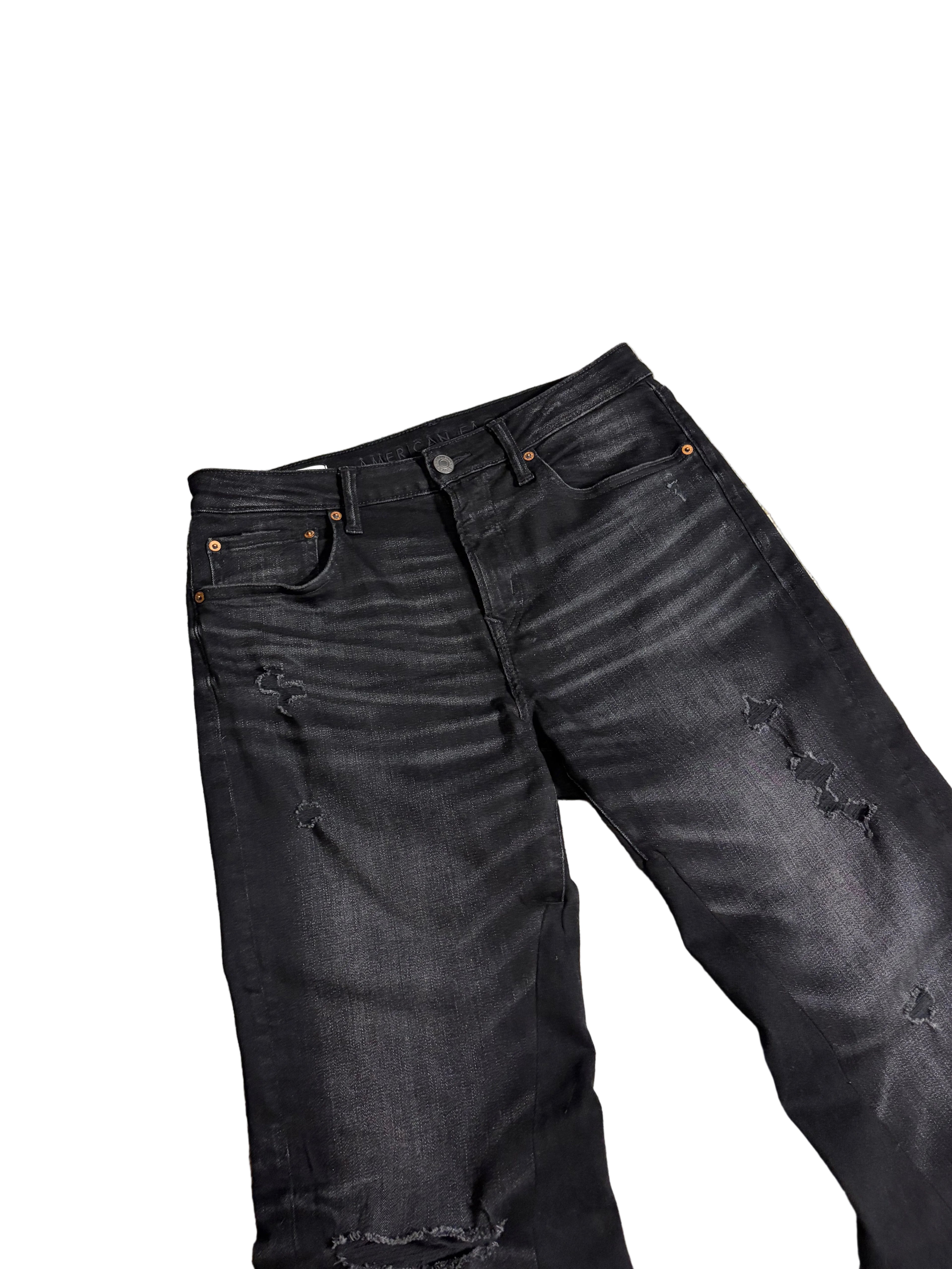Distressed black flared jeans. Size: 32x34
