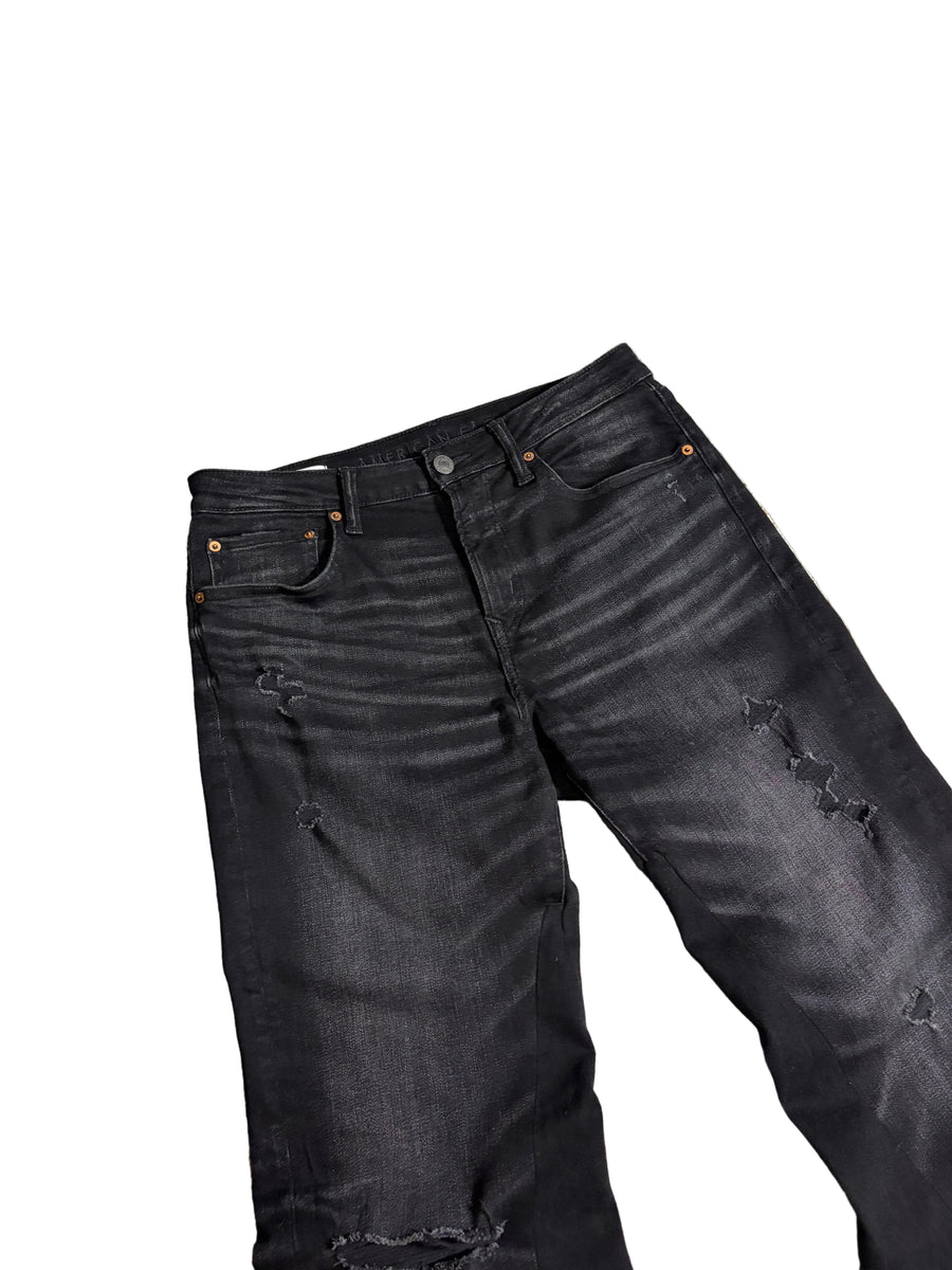 Distressed black flared jeans. Size: 32x34