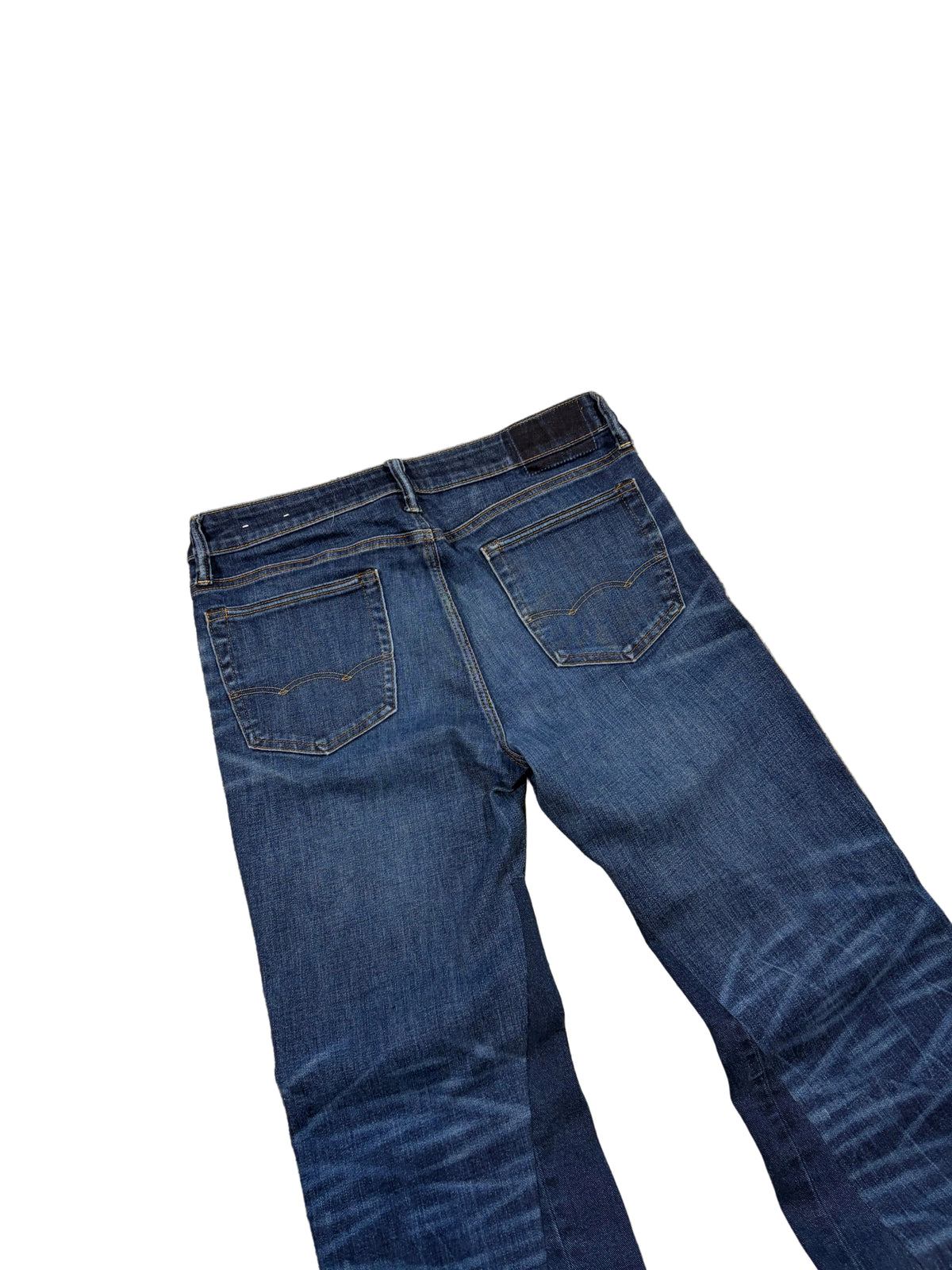 Dark blue bootcut jeans. Size: 32x34