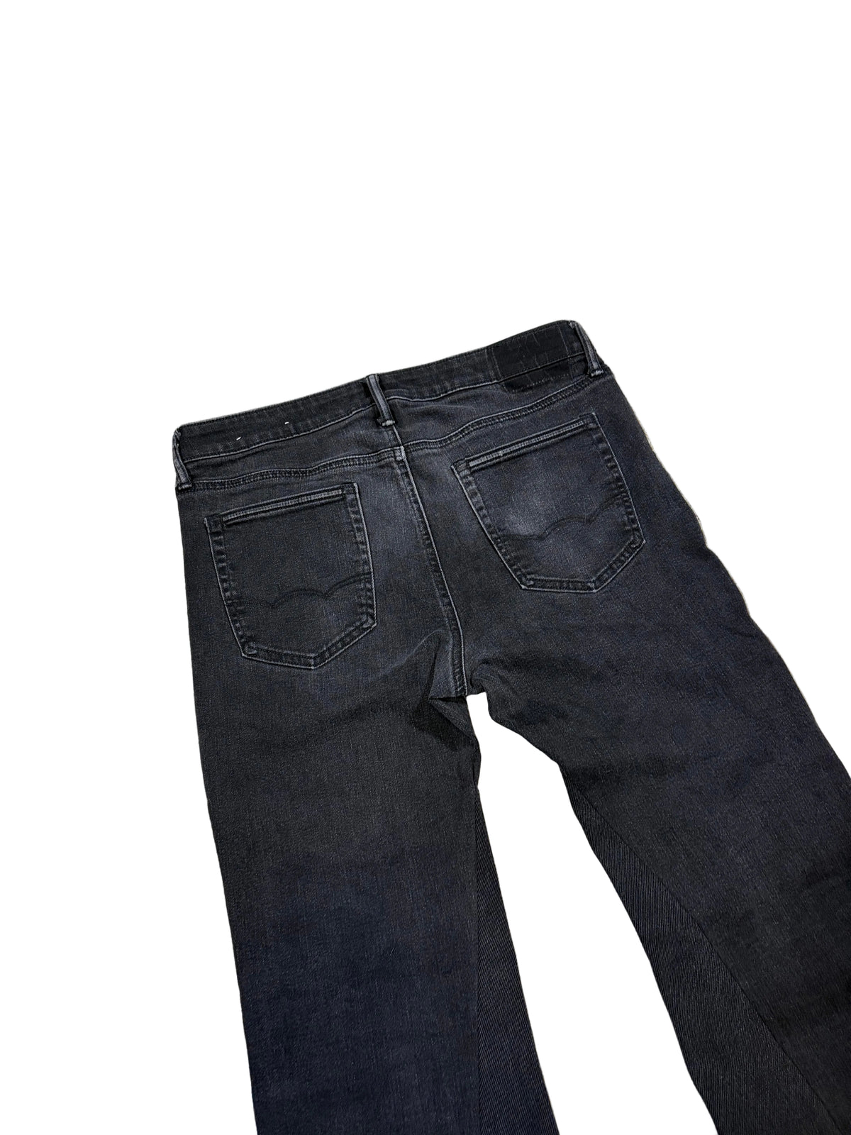 1of1 black stacked flared jeans. Size: 34x34