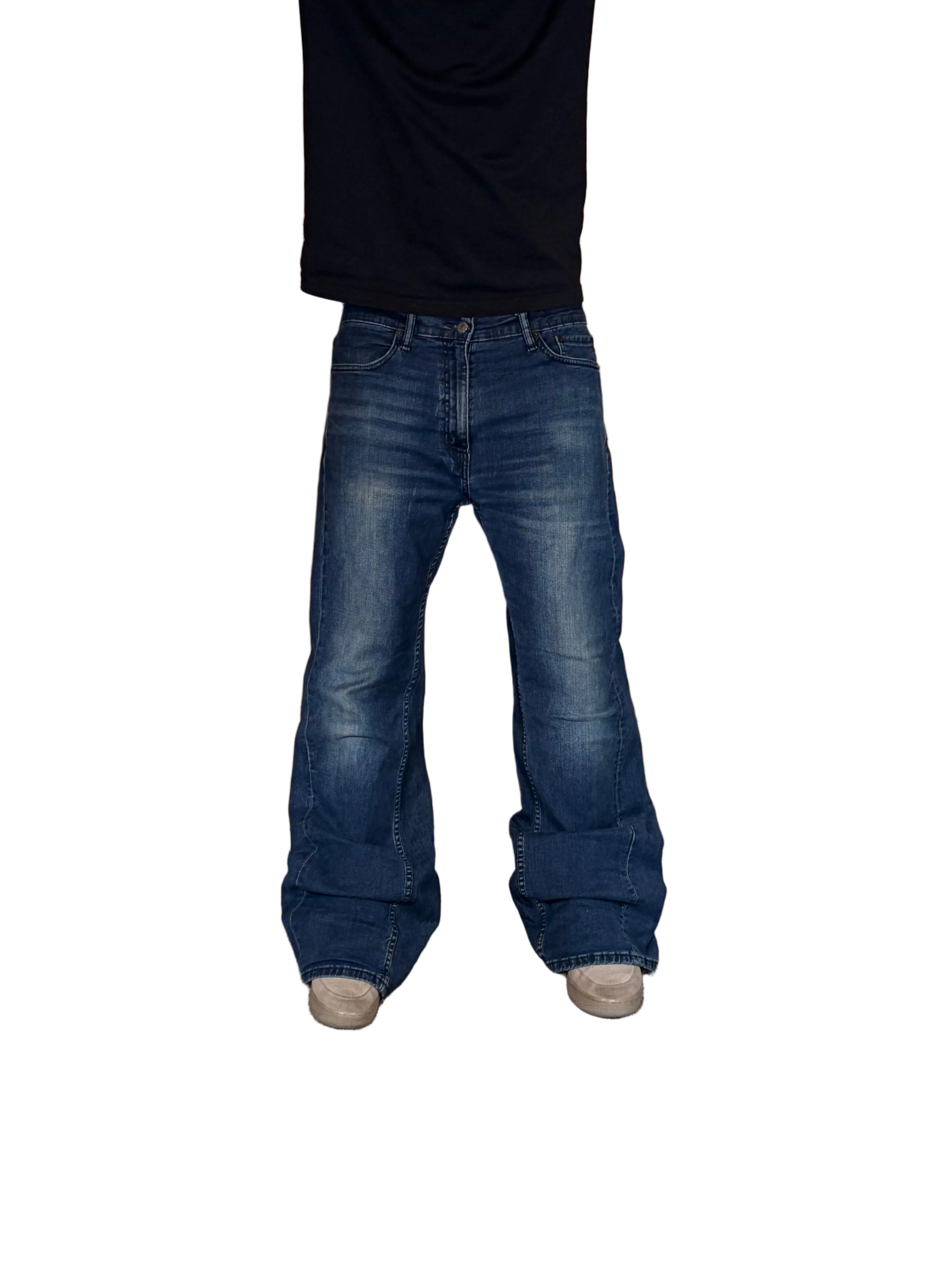 1of1 Vintage dark blue flared jeans. Size: 34x34