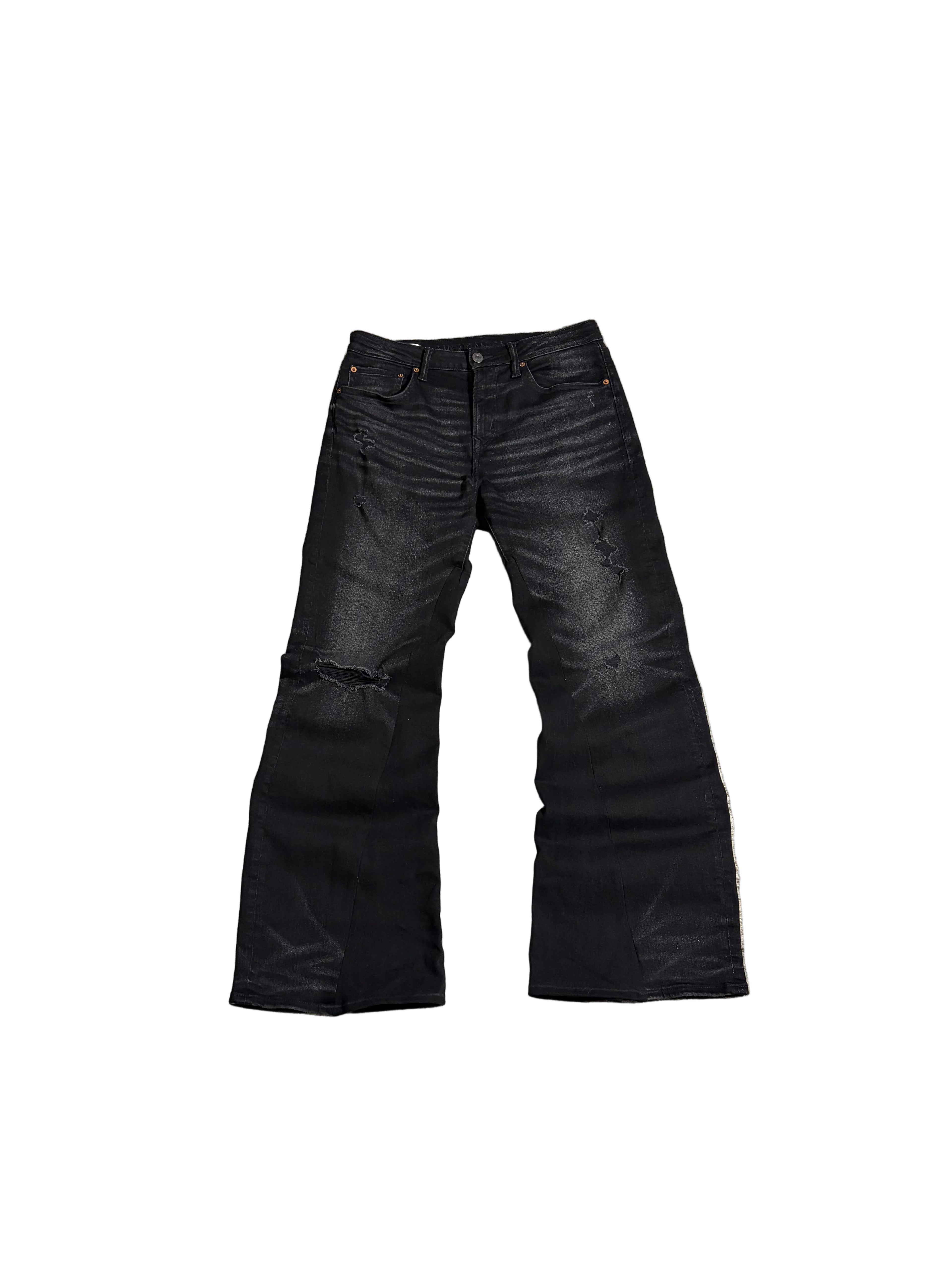 Distressed black flared jeans. Size: 32x34