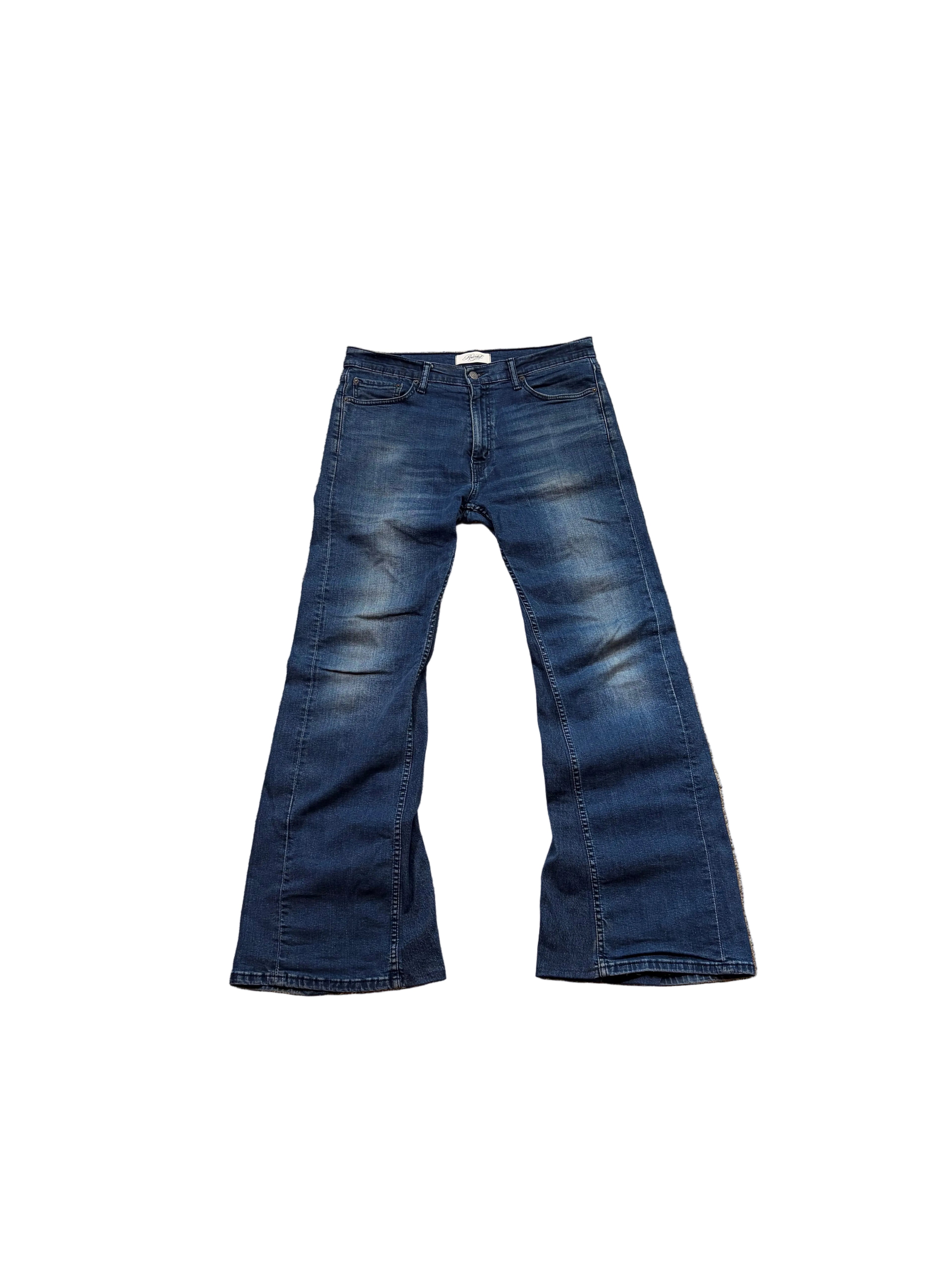 1of1 Vintage dark blue flared jeans. Size: 34x34