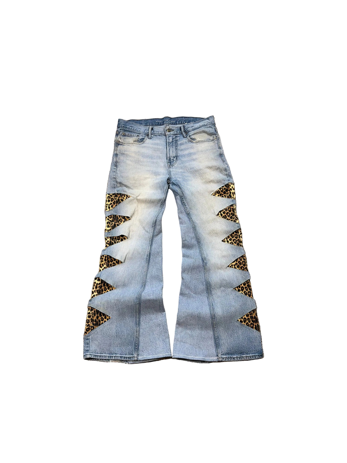 1of1 reworked light blue cheetah print distressed jeans. Size: 34x32