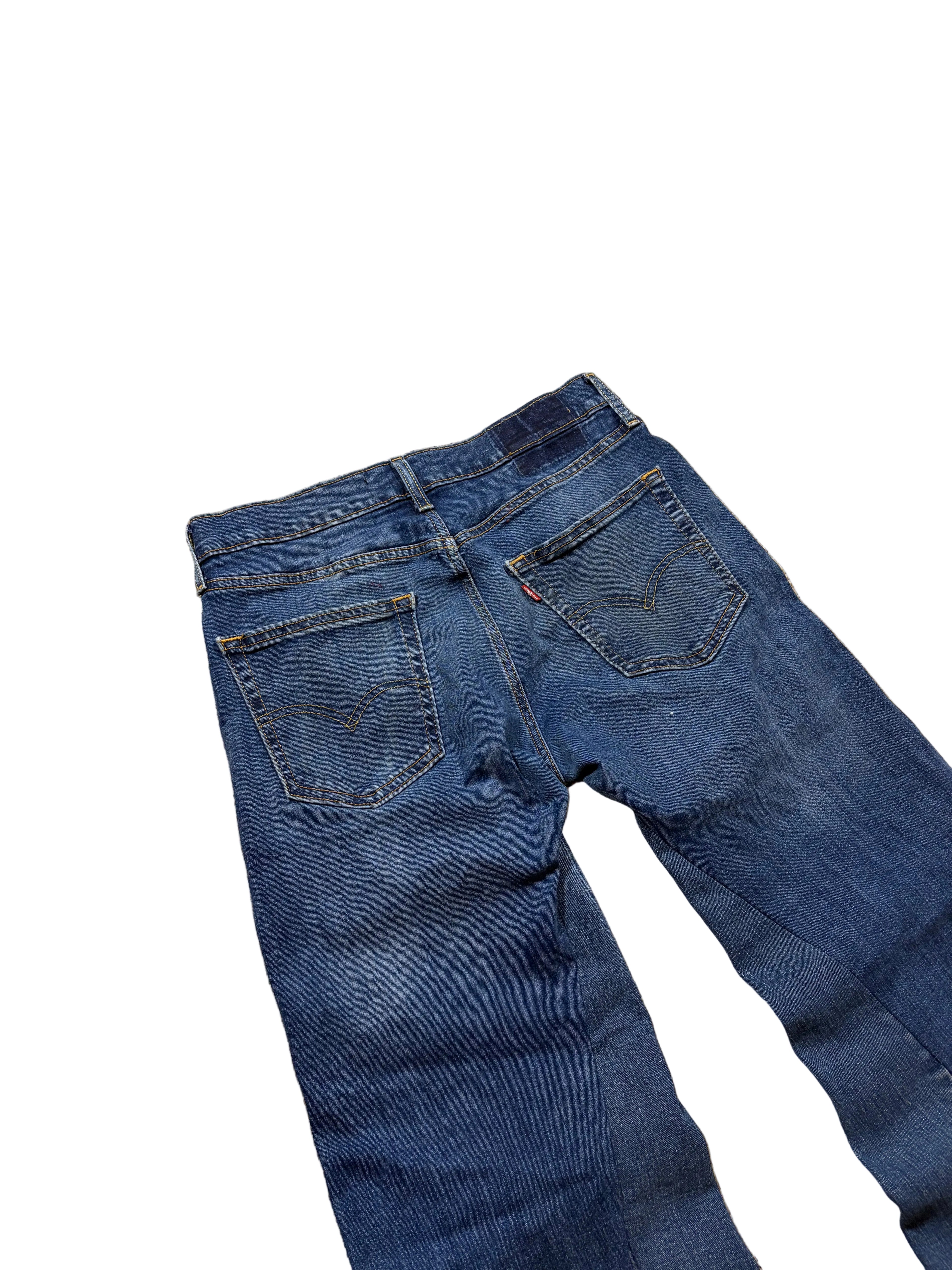 Dark blue painted bootcut jeans. Size: 32x32