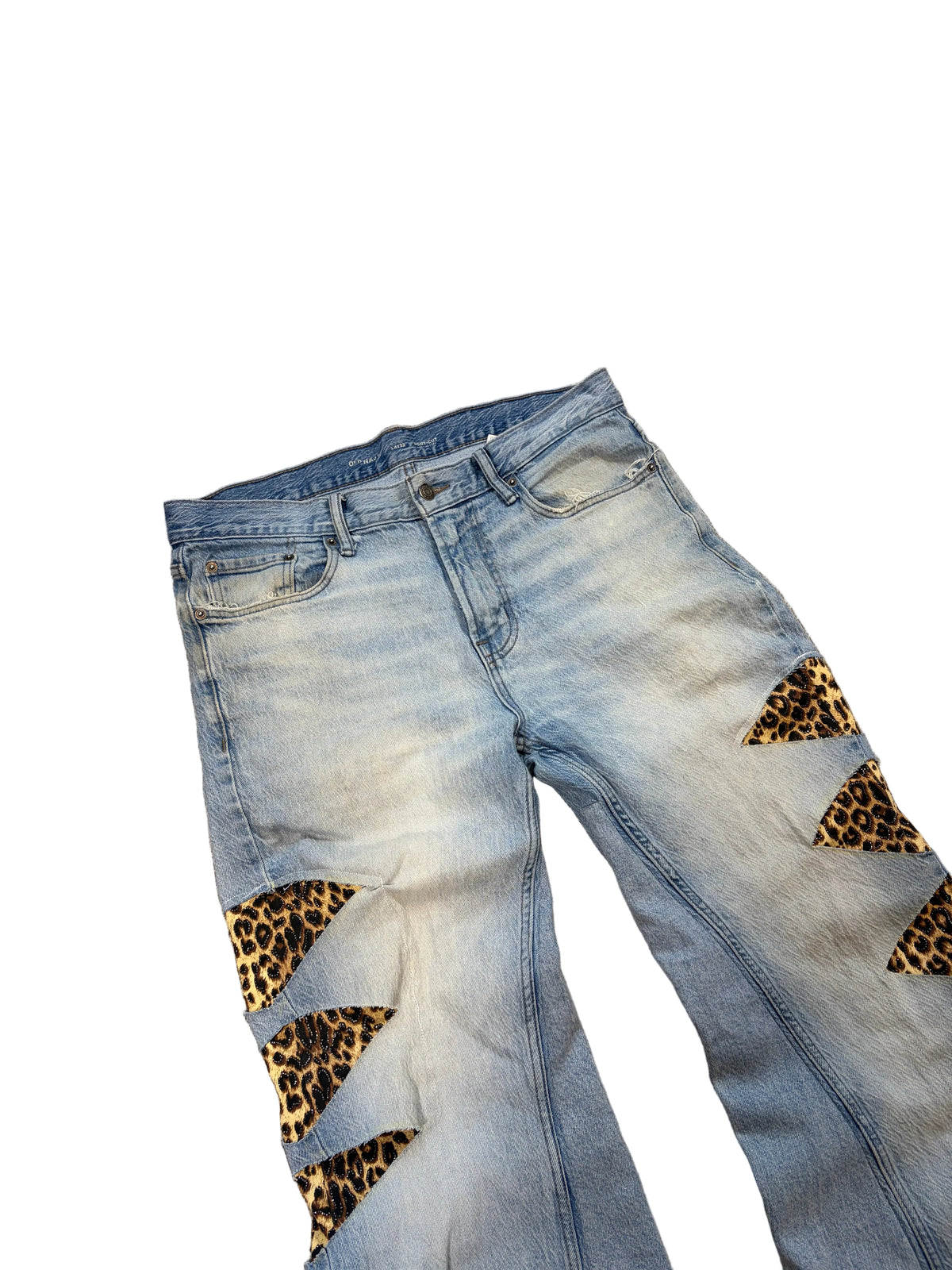 1of1 reworked light blue cheetah print distressed jeans. Size: 34x32