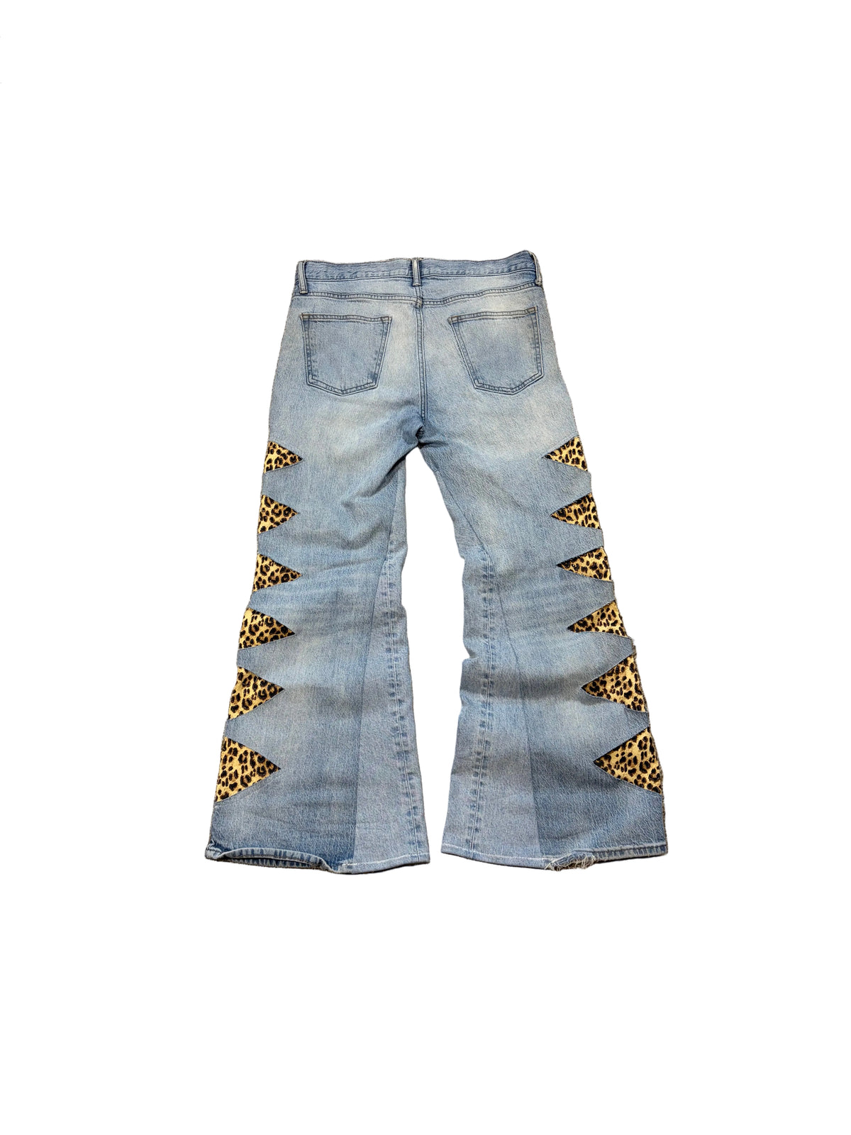 1of1 reworked light blue cheetah print distressed jeans. Size: 34x32