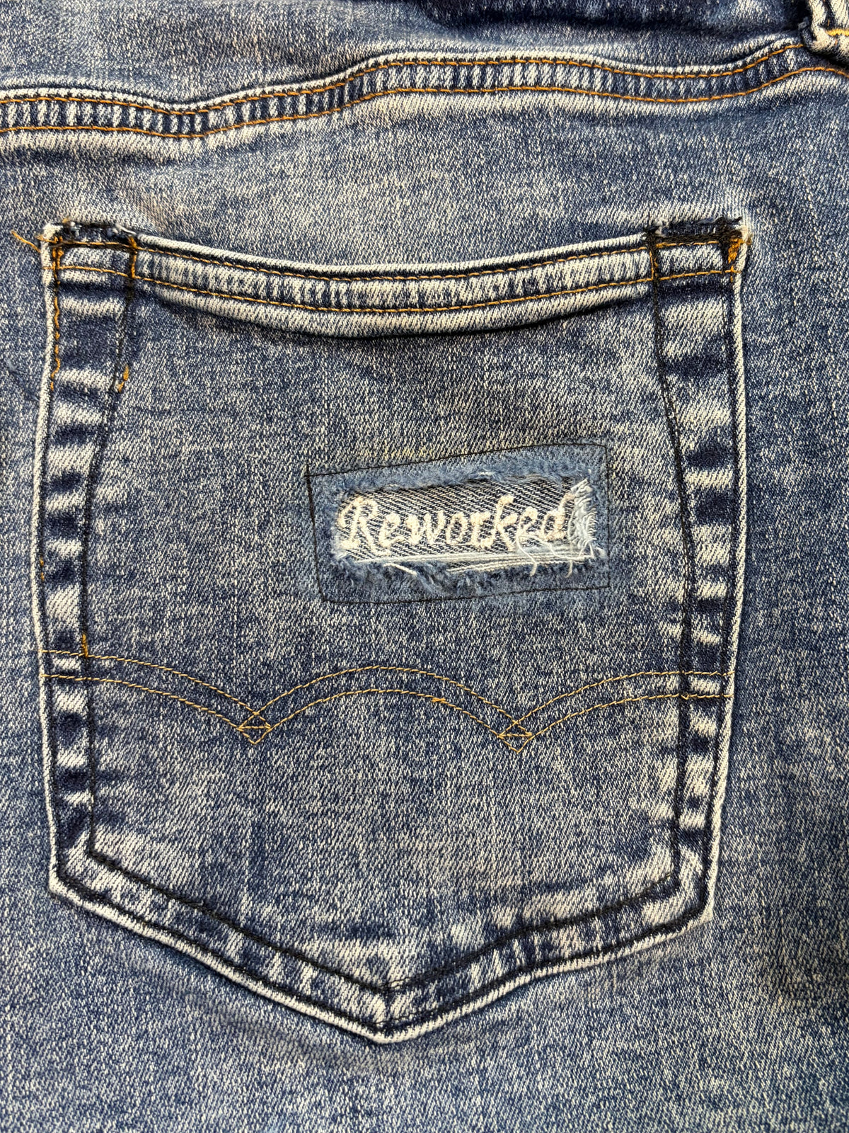 1of1 washed blue bootcut jeans. Size: 34x34