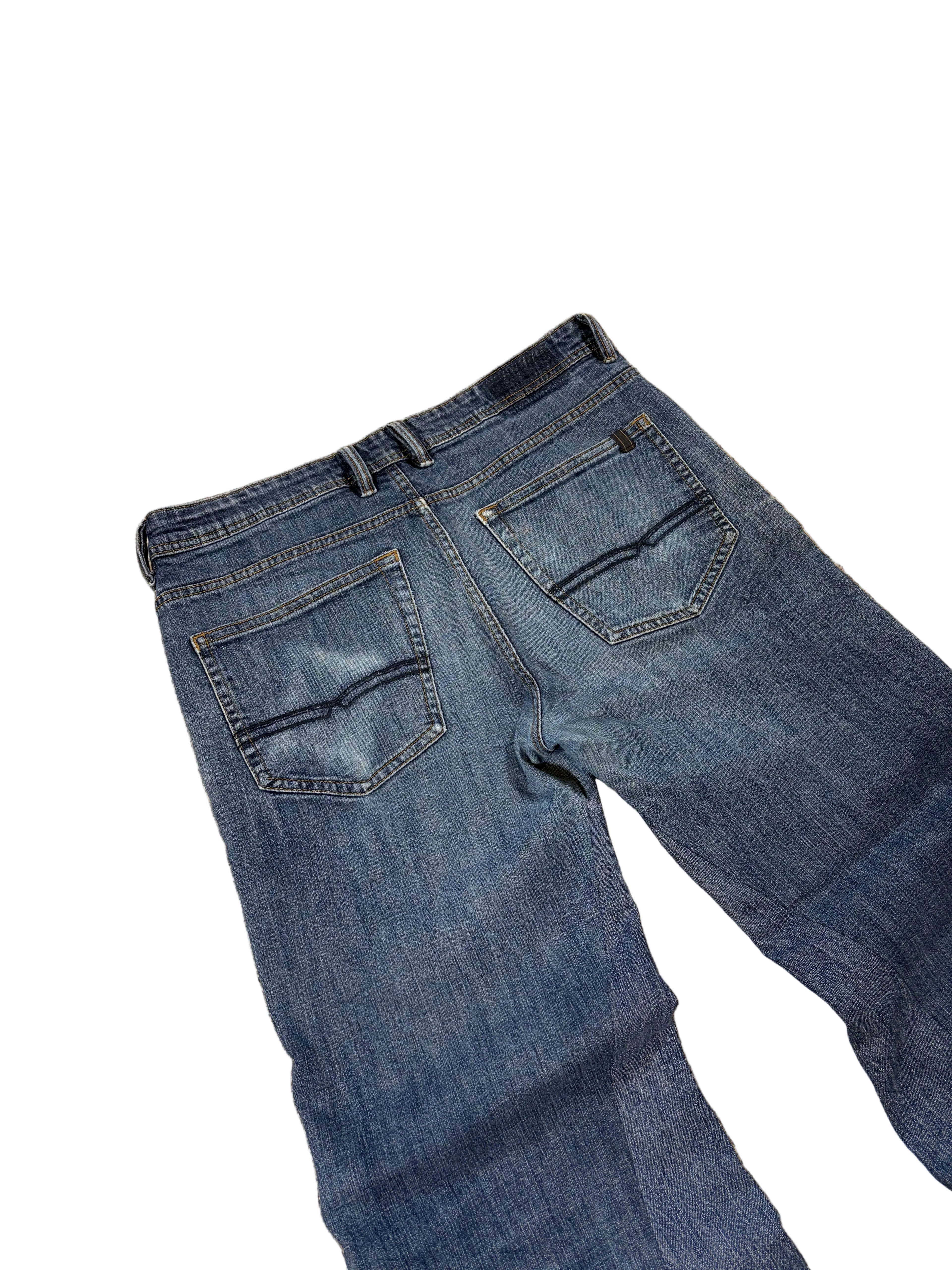 1of1 vintage blue reworked jeans. Size: 34x32