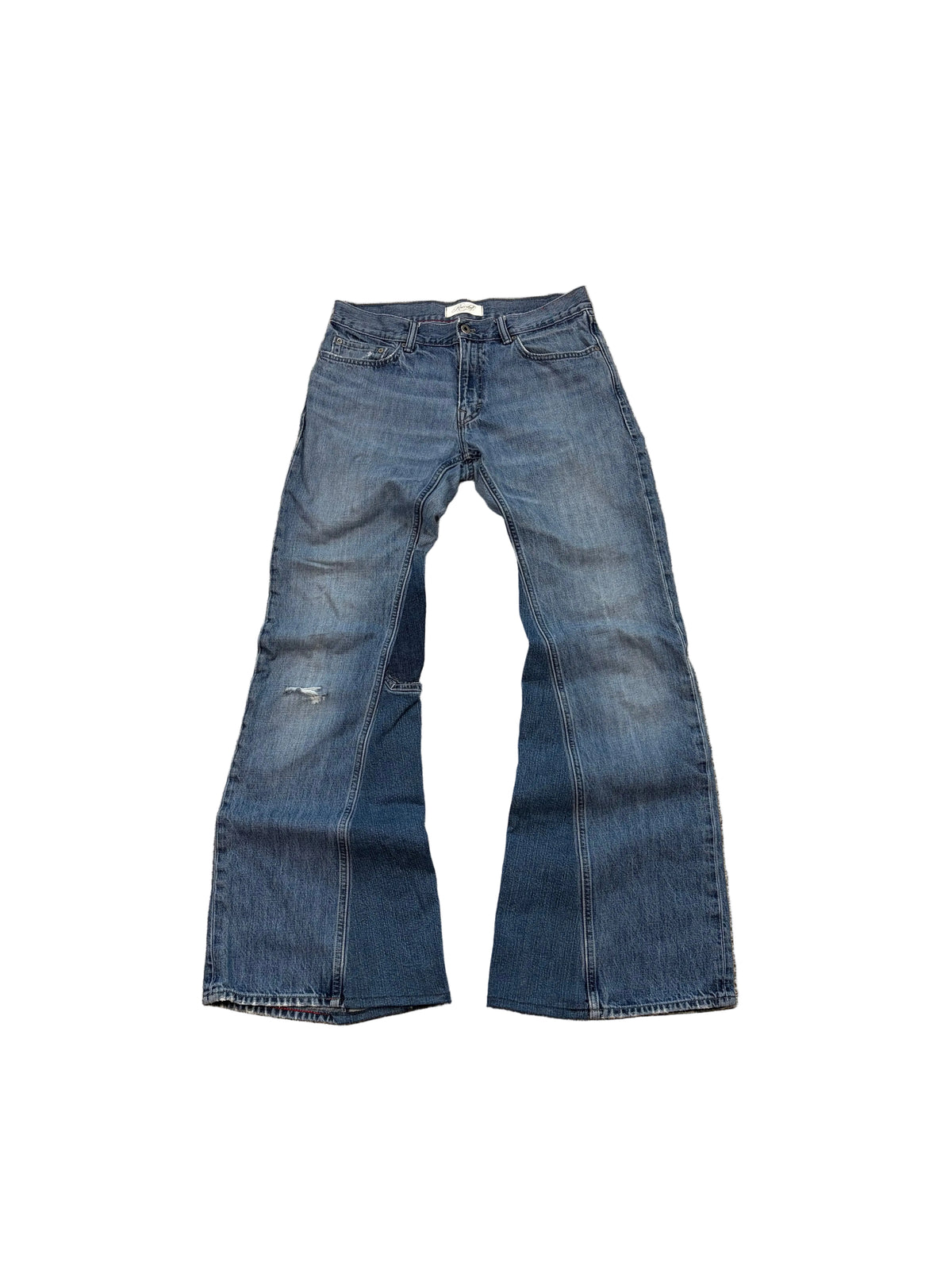 Vintage blue ripped baggy bootcut jeans. Size: 32x36
