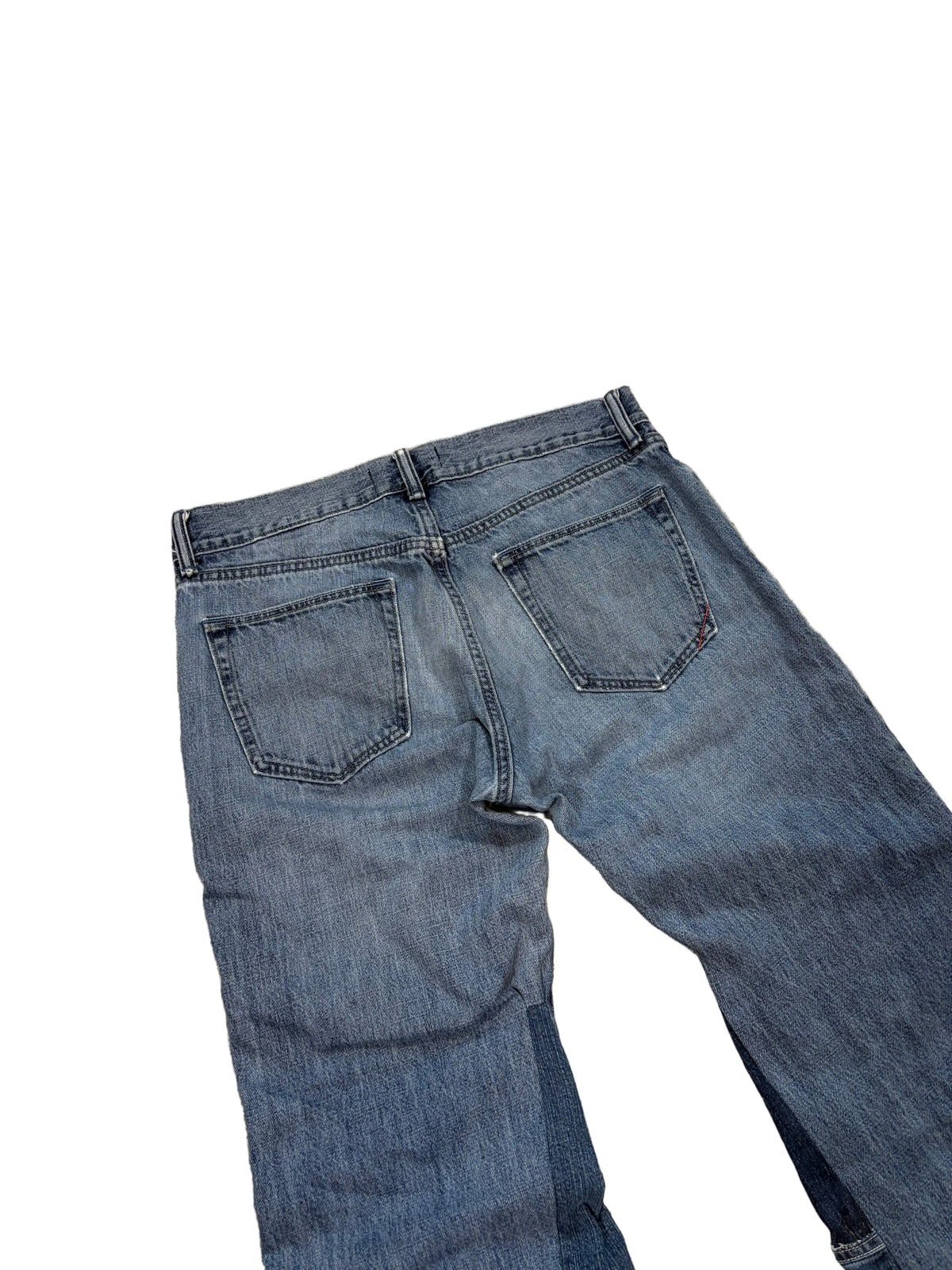 Vintage blue ripped baggy bootcut jeans. Size: 32x36