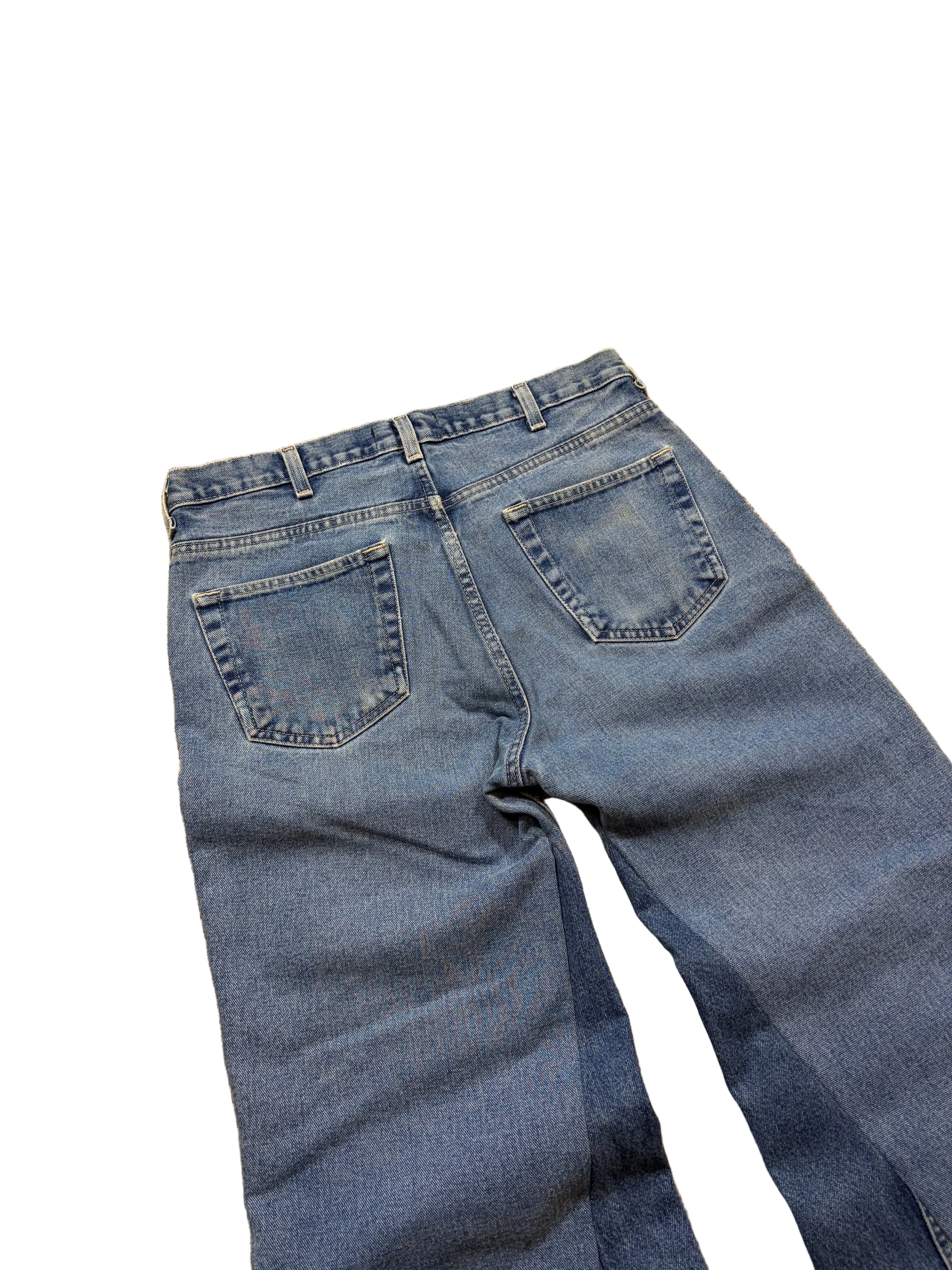 Light blue vintage baggy jeans. Size: 32x30