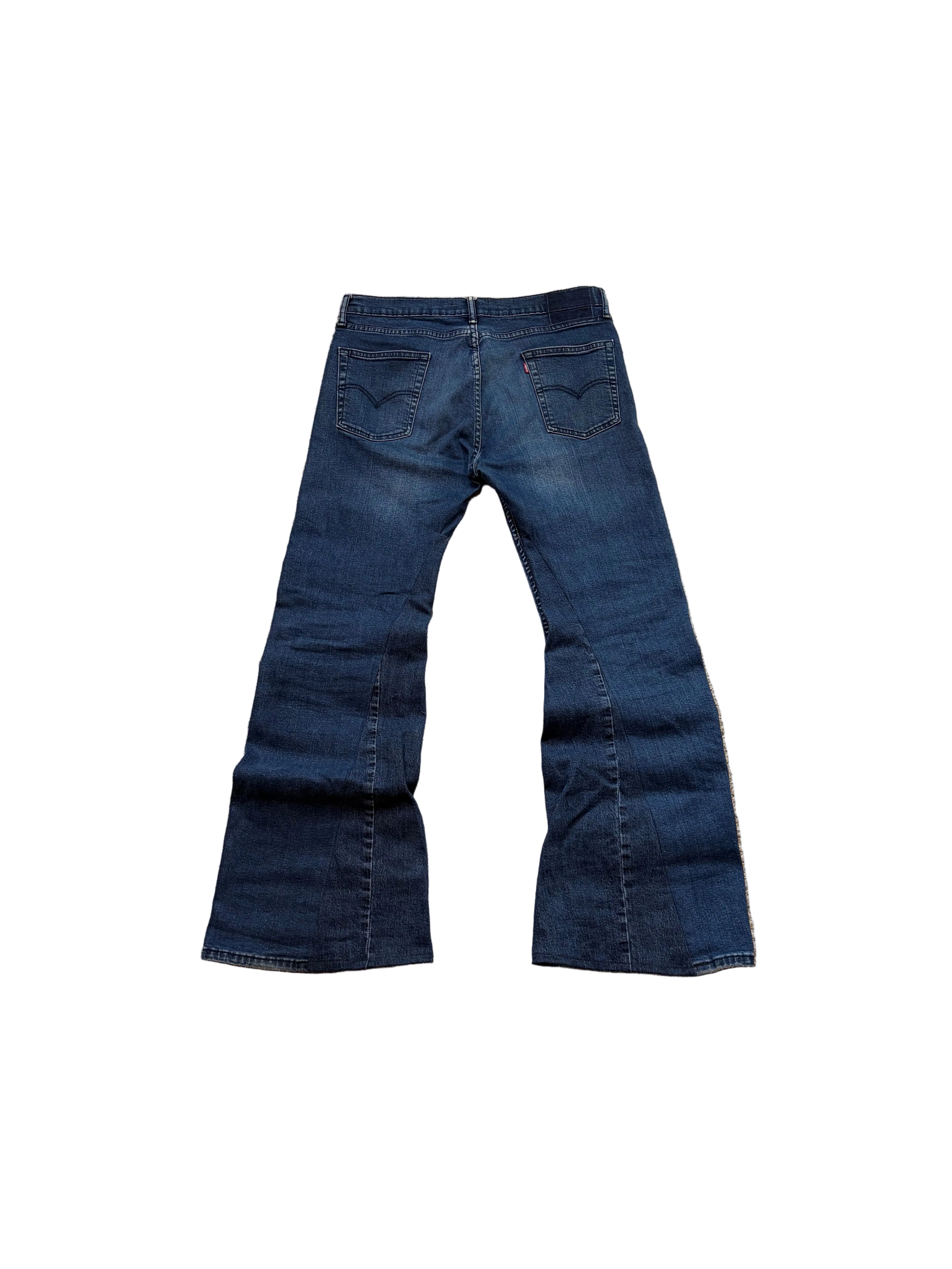 1of1 Vintage dark blue flared jeans. Size: 34x34