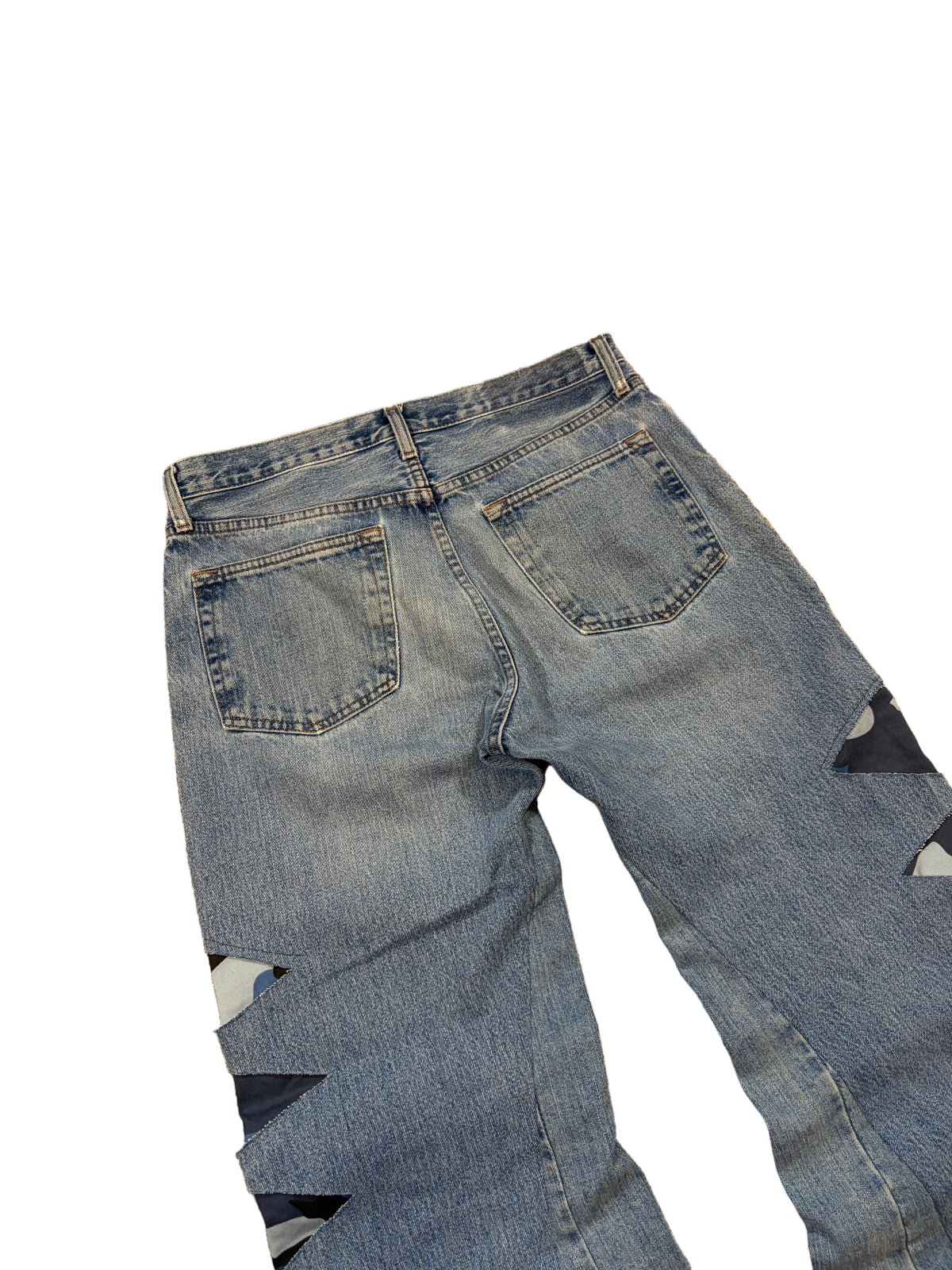 Blue camo distressed baggy bootcut jeans. Size: 33x32