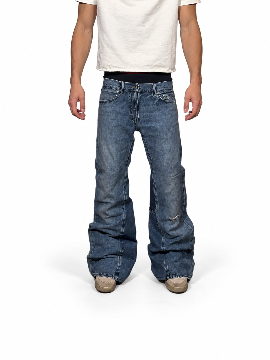 Vintage blue ripped baggy bootcut jeans. Size: 32x36