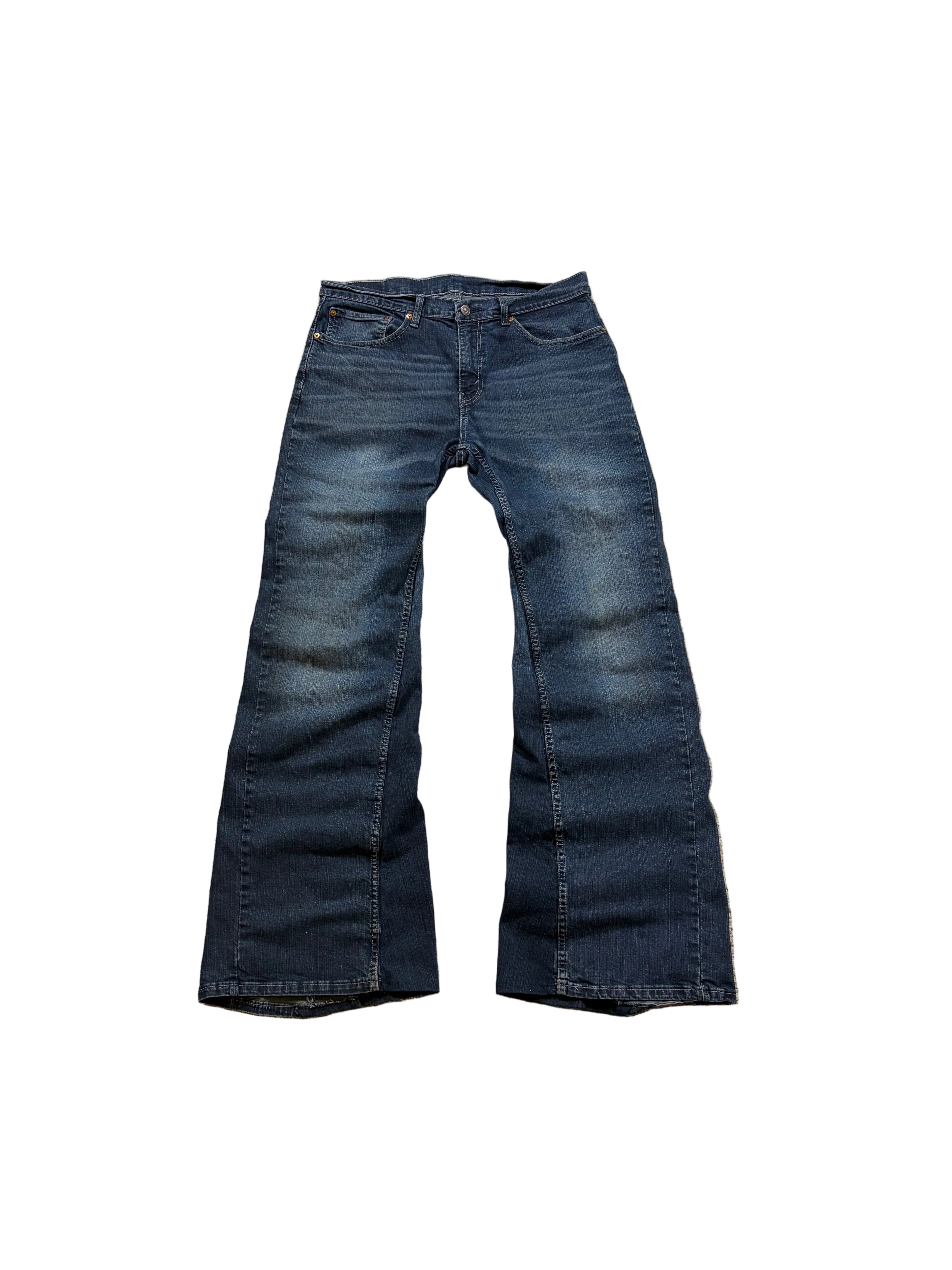 Vintage dark blue bootcut jeans. Size: 34x36