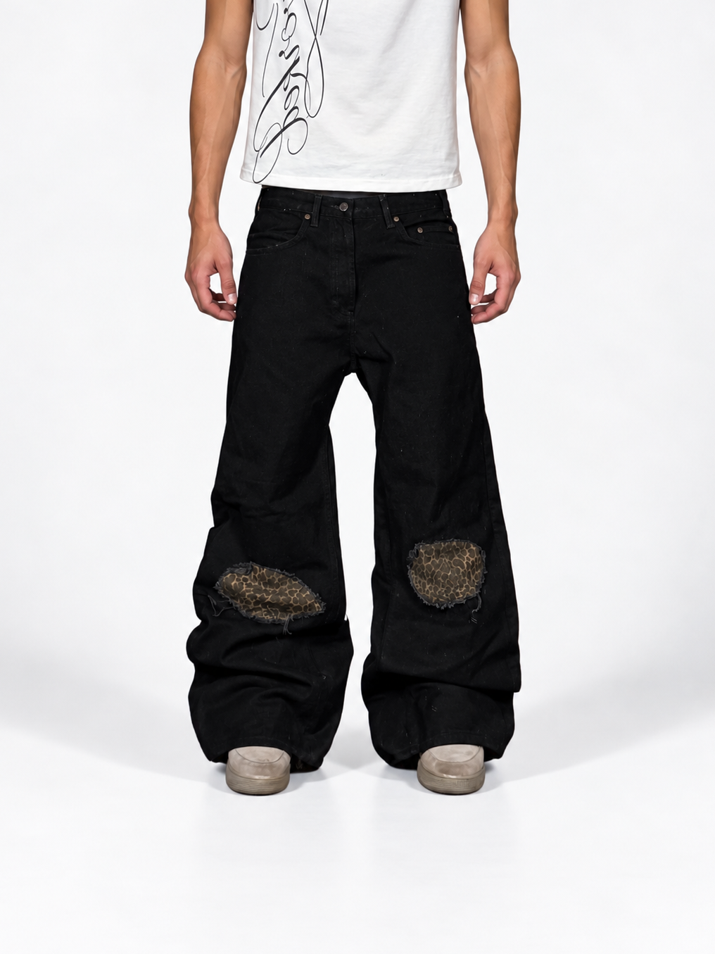 1of1 reworked distressed jet black jeans. Size: 34x32
