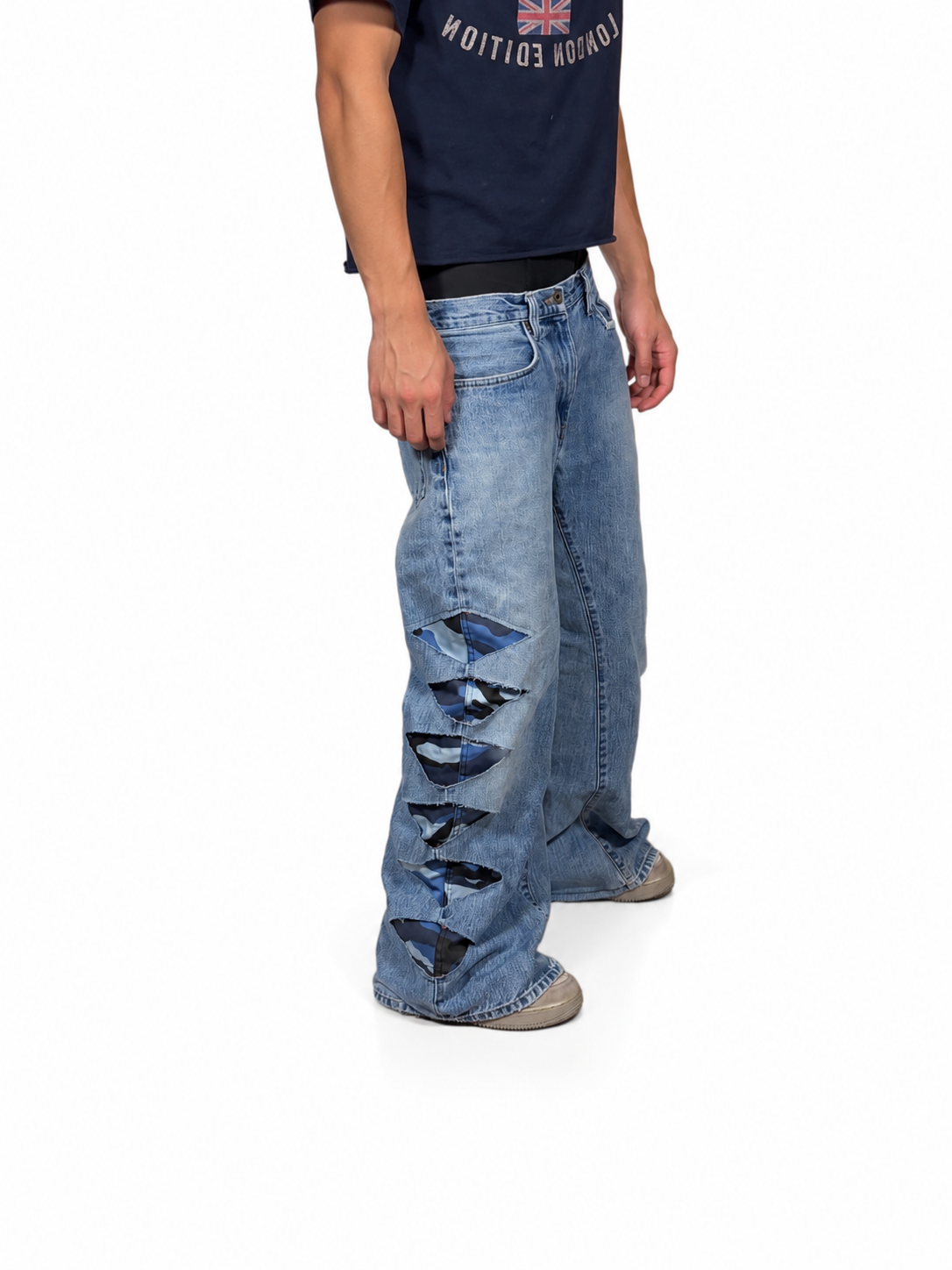 Blue camo distressed baggy bootcut jeans. Size: 33x32