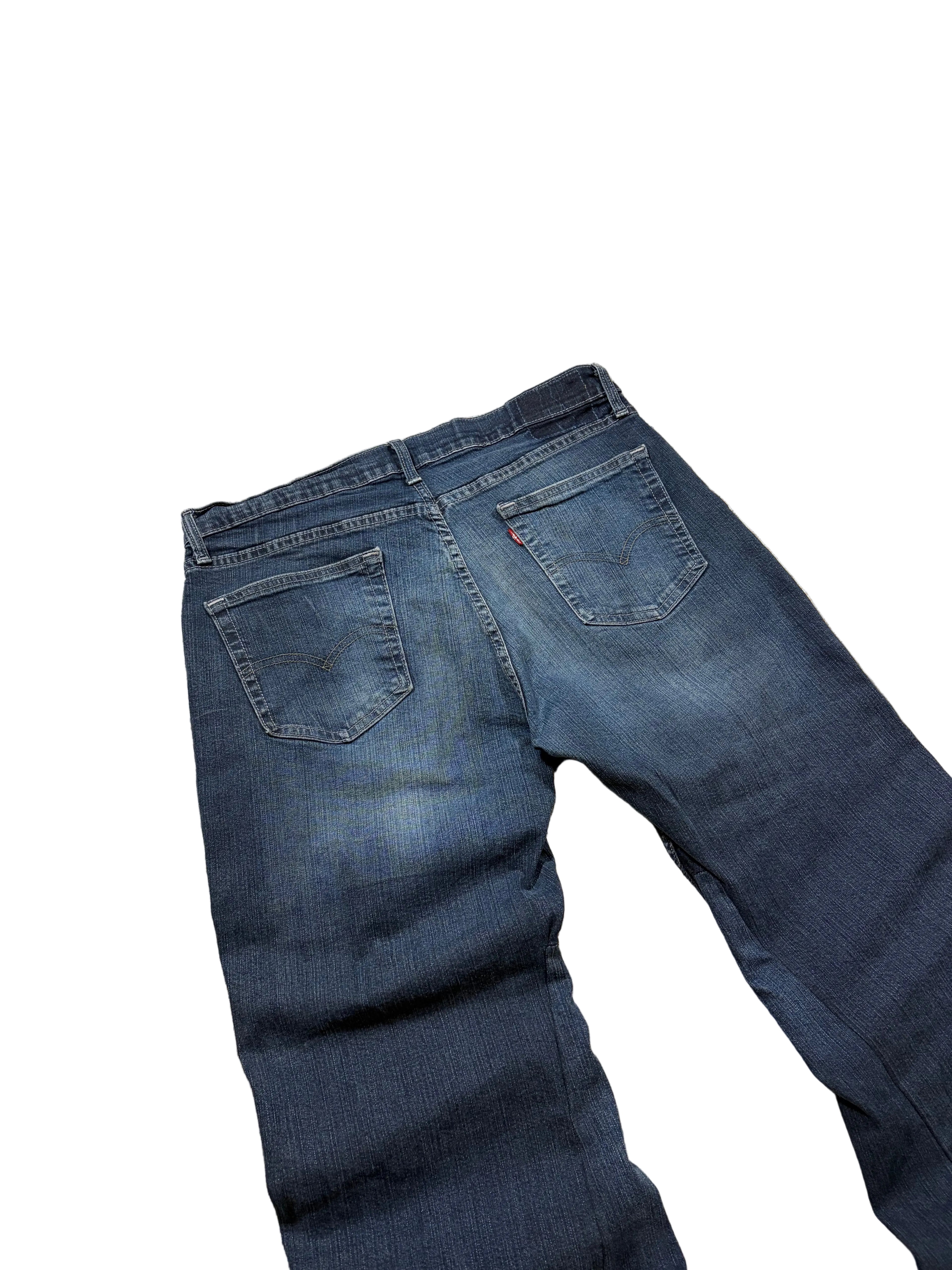 Vintage dark blue bootcut jeans. Size: 34x36