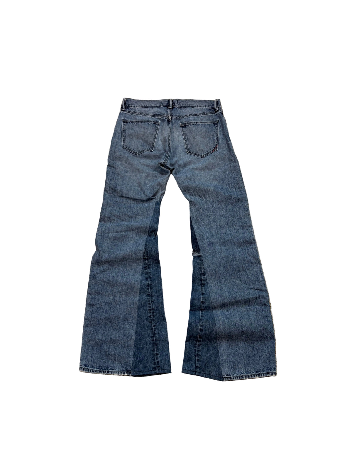 Vintage blue ripped baggy bootcut jeans. Size: 32x36