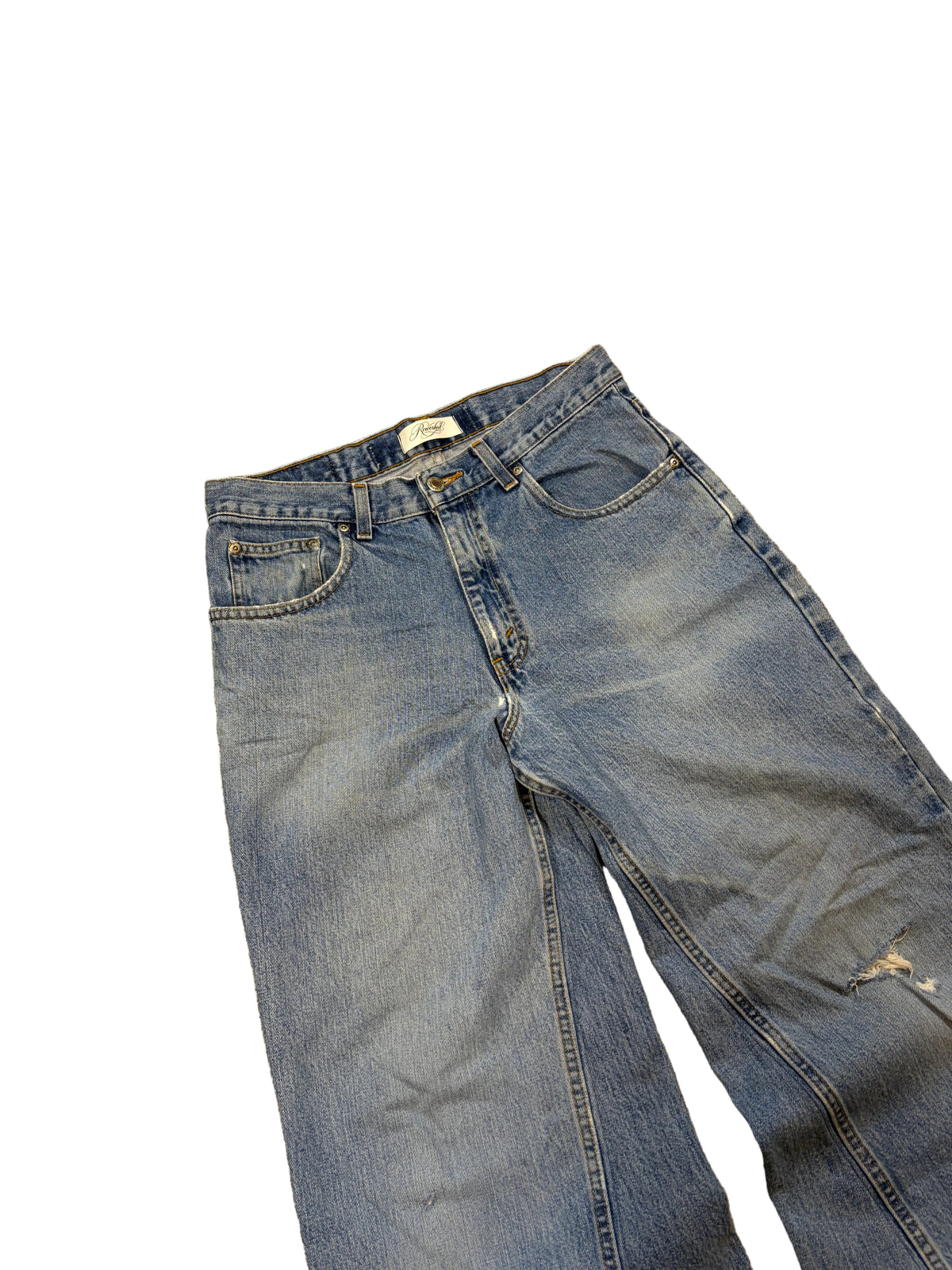 Light blue ripped baggy jeans. Size: 32x30
