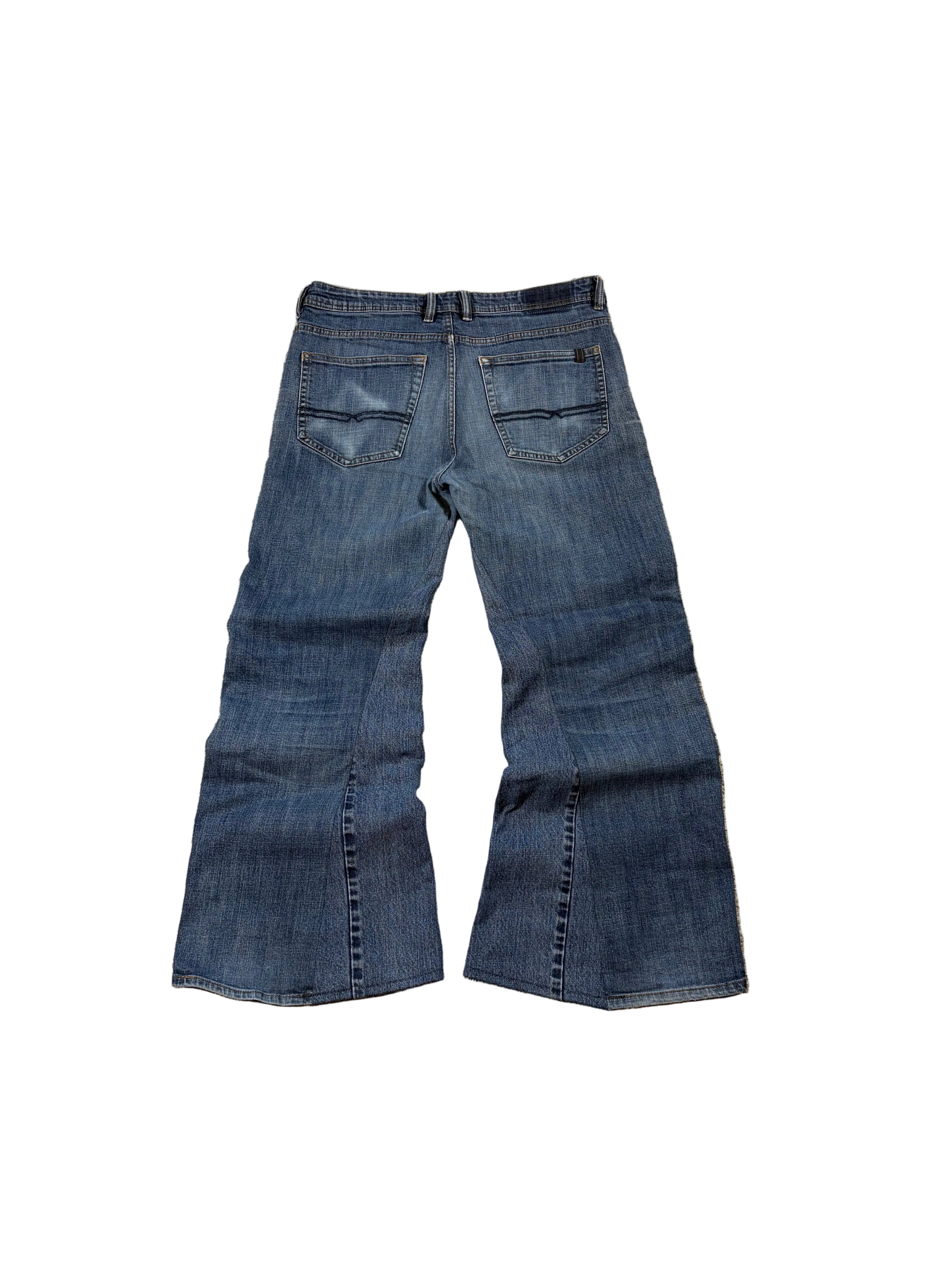 1of1 vintage blue reworked jeans. Size: 34x32