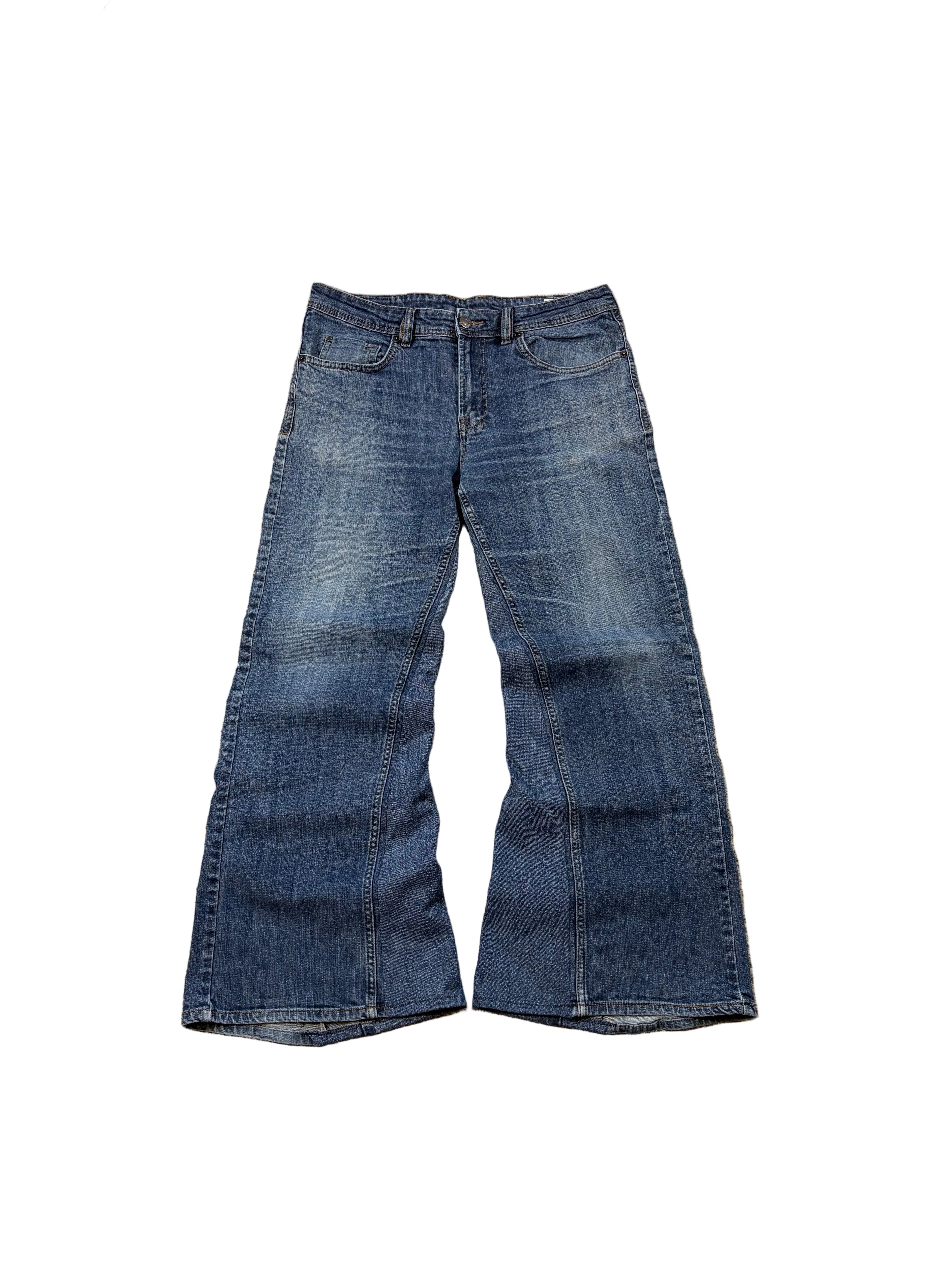 1of1 vintage blue reworked jeans. Size: 34x32